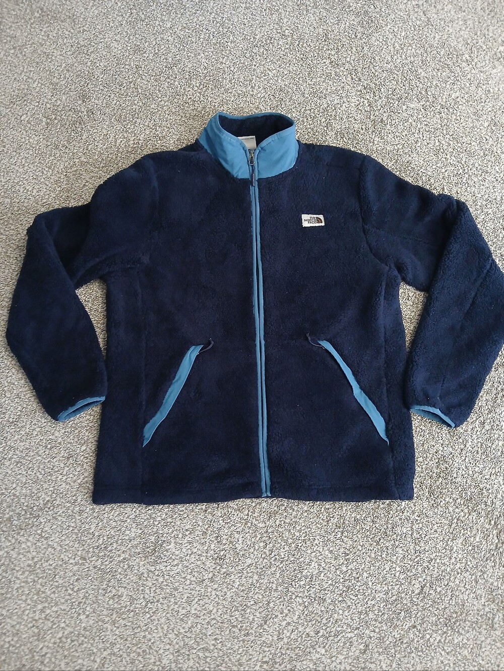 The North Face Navy Blue Fleece Jacket with Light Blue Trim Size L.